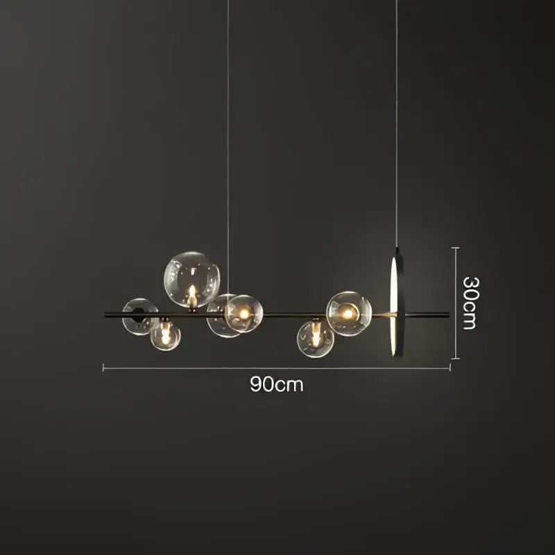 Modern black metal pendant lamps with clear glass ball bulbs and minimalist design for dining room decorbites glass ball