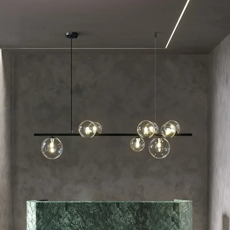 Modern black metal pendant light with clear glass ball bulbs for dining room decorbites glass ball pendant chandelier