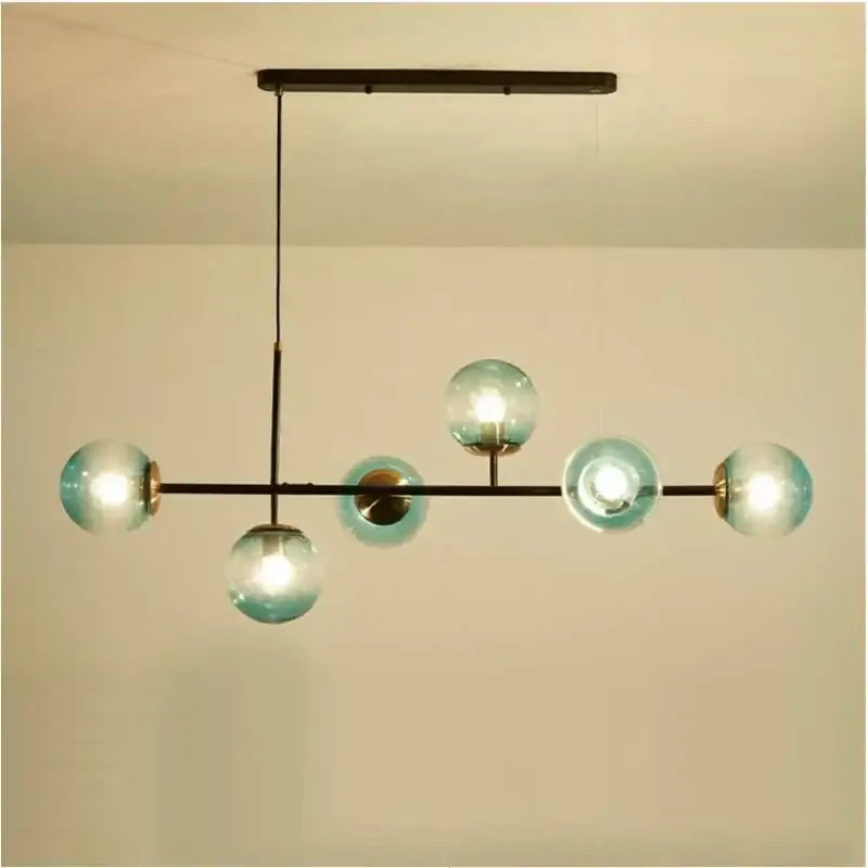 Modern black glass ball pendant light featuring five translucent teal glass spheres for stylish living room decorbites chandelier