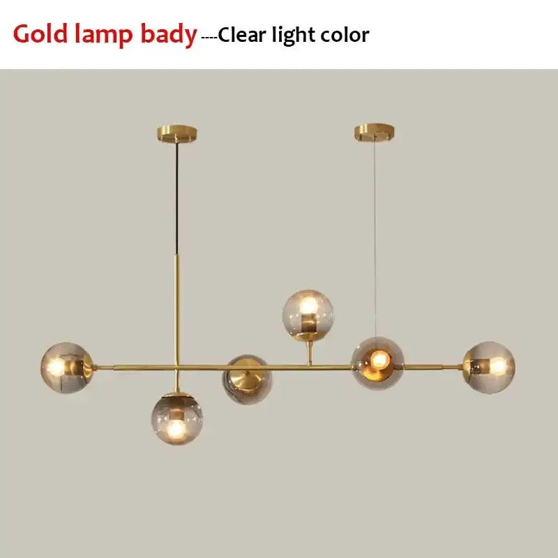 Modern black glass ball pendant light chandelier with gold-toned fixture and clear glass globe shades decorbites glass ball decor