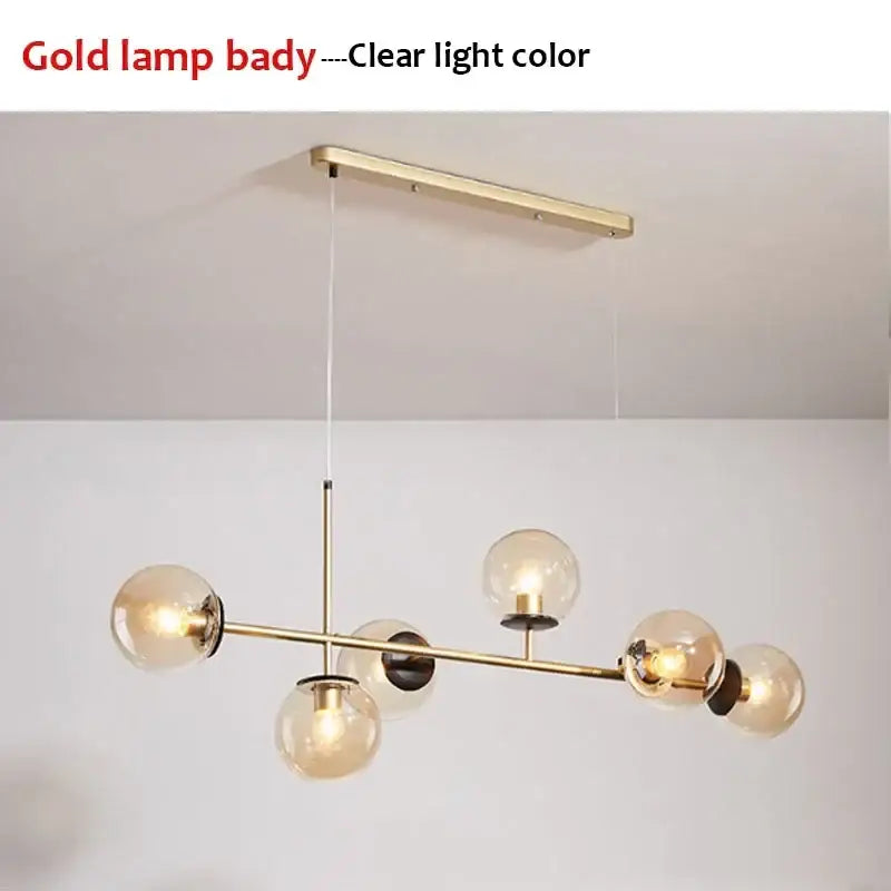 Modern chandelier pendant light with gold-toned frame and five clear glass globe bulbs decorbites glass ball design