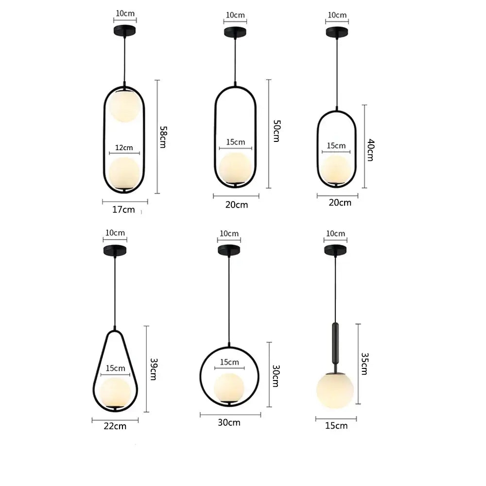 Modern black metal pendant lights set of 4 with frosted glass ball shades in elongated and circular designs decorbites glass ball