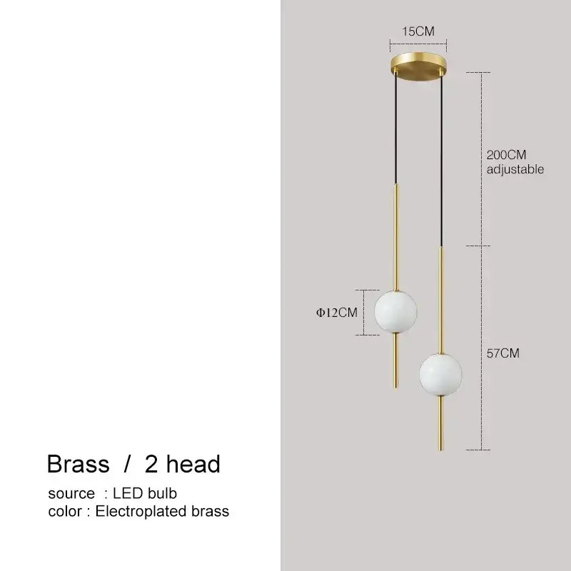 Modern black glass ball pendant lights featuring brass fixture with two white glass shades and adjustable height for dining room decorbites glass ball pendant