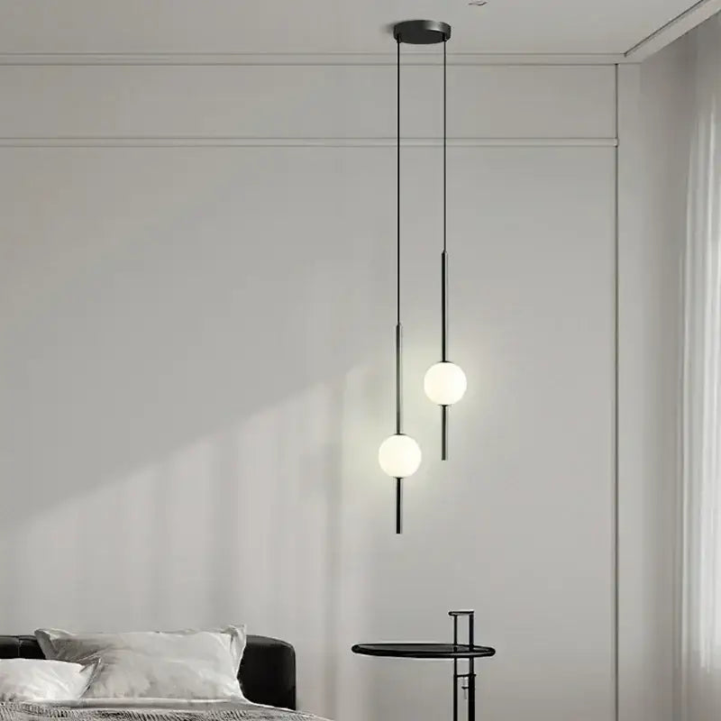 Modern black glass ball pendant lights with spherical frosted shades for dining room decorbites glass ball pendant