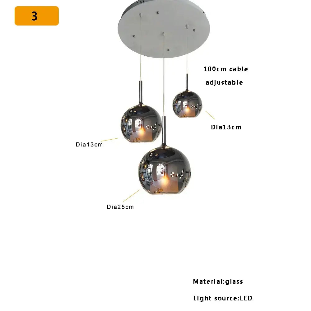 Modern black chrome-finished glass ball pendant lights with three spherical shades for kitchen island decorbites glass ball