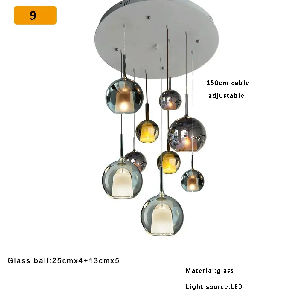 Modern black glass ball pendant lights for kitchen island featuring decorbites glass ball with warm led lighting