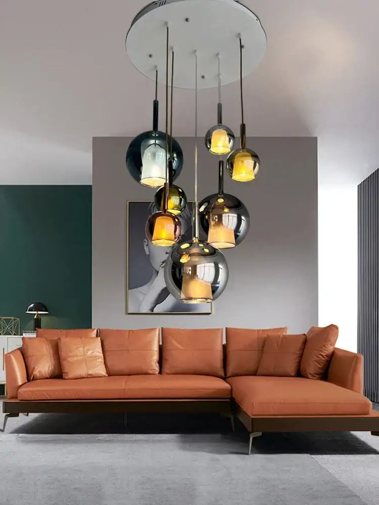 Modern black glass ball pendant lights with spherical glass pendant and warm amber lighting for kitchen island decorbites glass ball