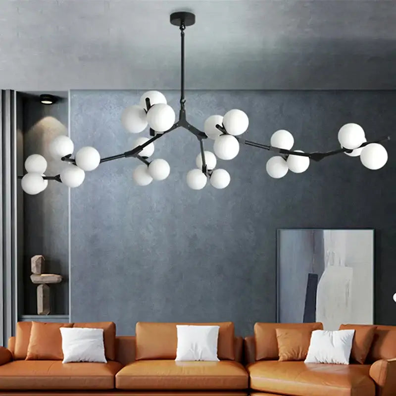 Modern black metal chandelier featuring multiple white glass balls led globes for stylish living room decorbites glass balls lighting