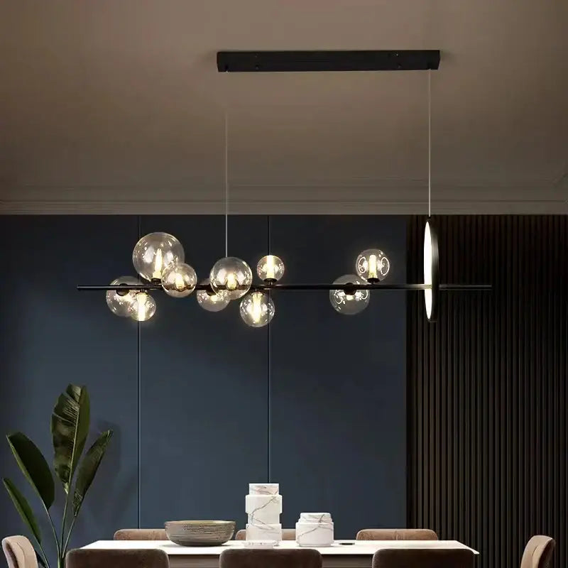 Modern black glass bubble chandelier with clear glass bubble bulbs and sleek minimalist design for dining room decorbites clear glass