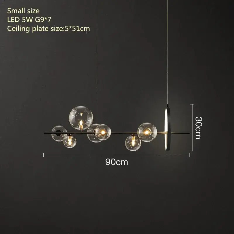 Modern black metal glass bubble chandelier with clear globe bulbs and sleek linear design for dining room decorbites light