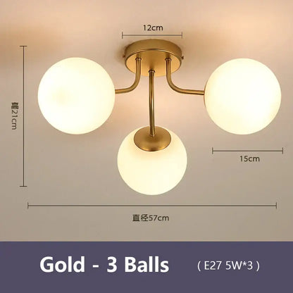 Gold-colored decorbites glass bubble ceiling light with three frosted glass globe bulbs for modern living room decor