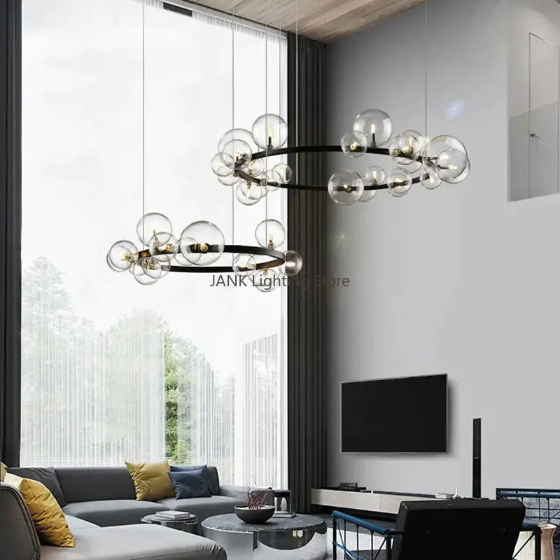 Modern black metal chandelier with clear glass bubble led bulbs in a circular cluster by decorbites for living room decor