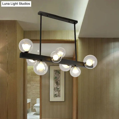 Modern black metal chandelier with clear glass globe bulbs for dining room by DecorBites™ linear pendant light