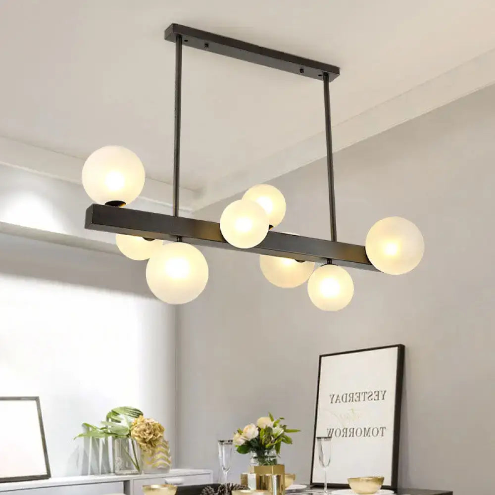 Modern black metal chandelier with frosted glass globe bulbs DecorBites™ pendant light for dining room and kitchen island