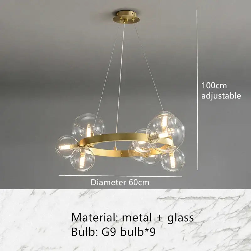 Modern gold-toned pendant light fixture with circular metal frame and nine clear glass globe bulbs for dining room