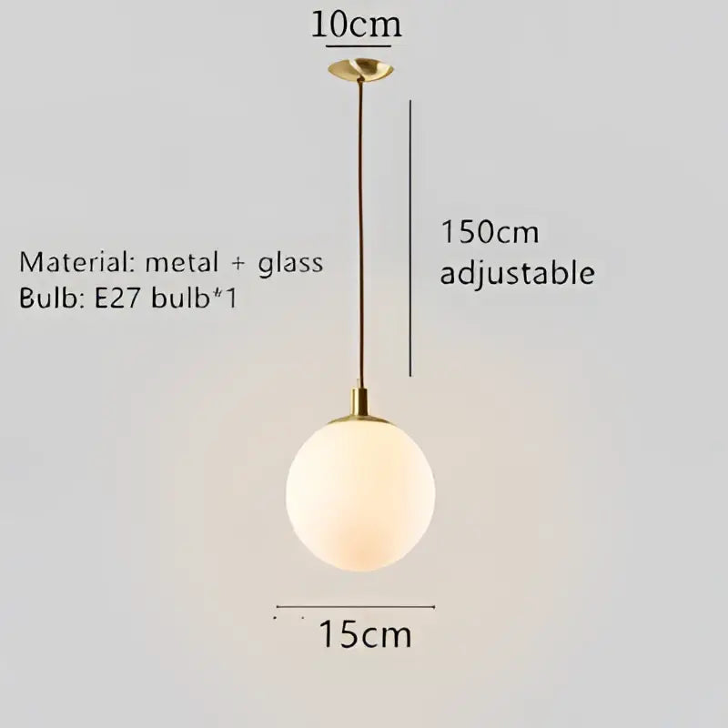 Modern black glass pendant light fixture with a 15cm frosted globe and brass-toned hardware for dining room lighting