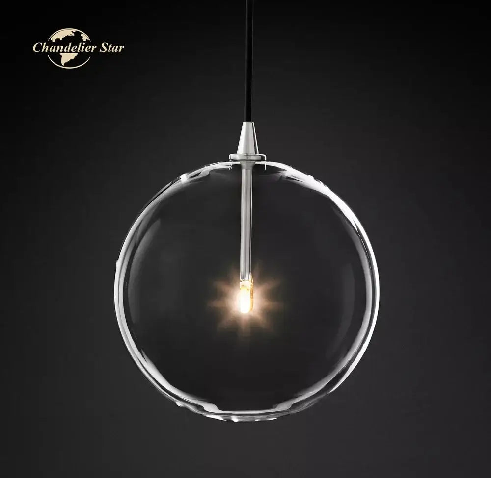 Modern black glass globe pendant light featuring a clear glass globe with silver rod and black cord for dining room decorbites glass globe