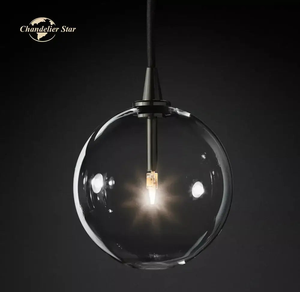 Modern black glass globe pendant light with clear glass globe and black metal fixture for dining room decorbites glass globe