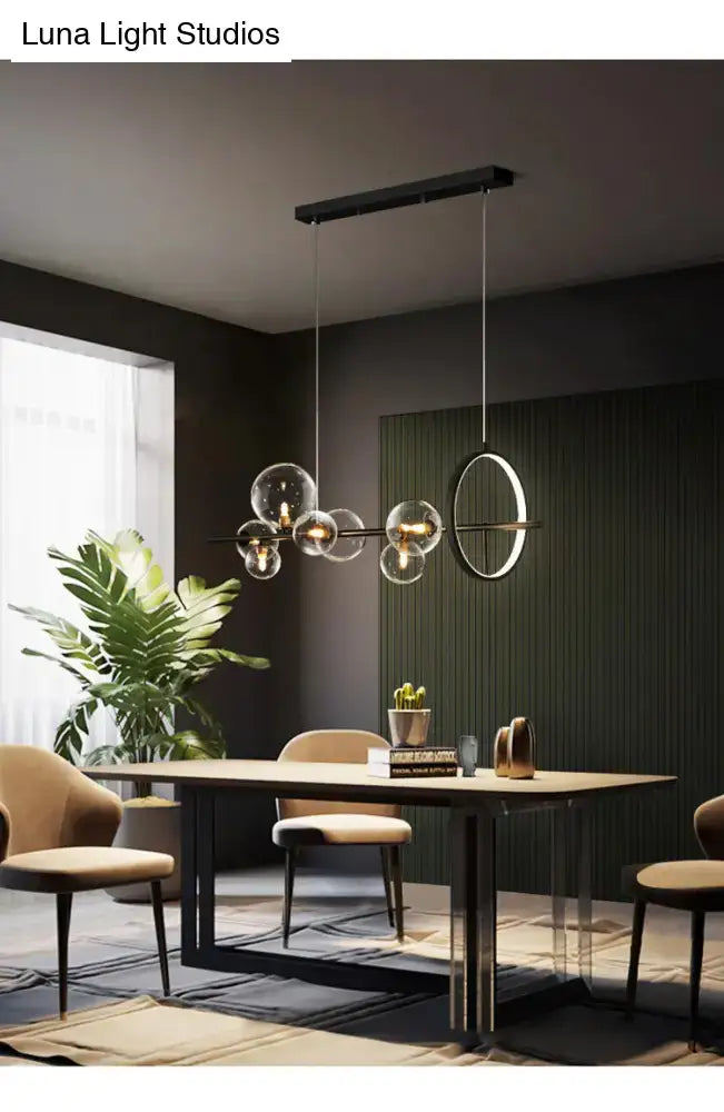 Modern black glass globe pendant light with spherical glass globes and circular ring for dining table bulb base lighting type