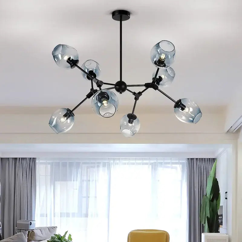 Modern black metal led chandelier pendant with multiple frosted glass globe shades for dining room lighting