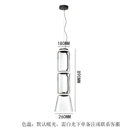 Modern black glass led pendant light with three stacked clear glass segments and black metal accents for dining room