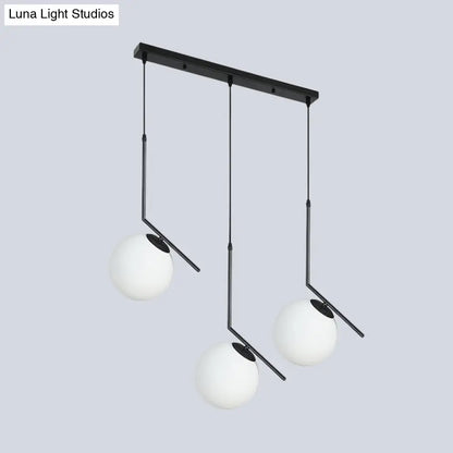 Modern Black Glass Orb Cluster Pendant Light with Angled Arm - 3-Light Ceiling Lamp