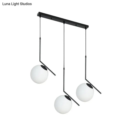 Modern Black Glass Orb Cluster Pendant Light with Angled Arm - 3-Light Ceiling Lamp