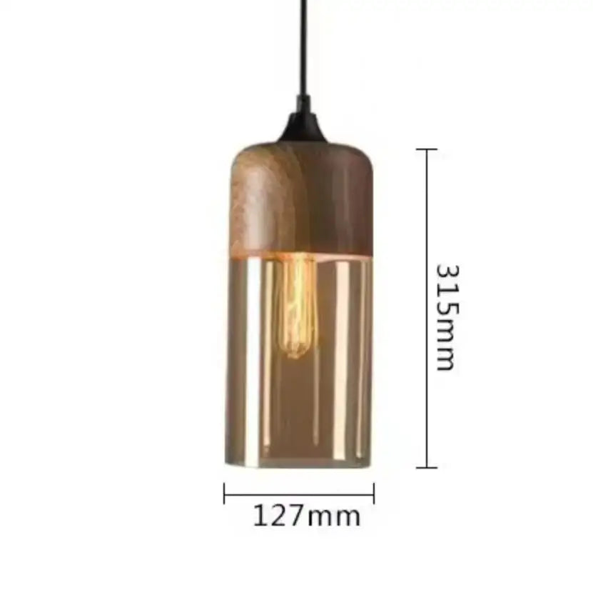 A modern pendant light with a cylindrical black glass body and wooden top for dining room decorbites black glass shades