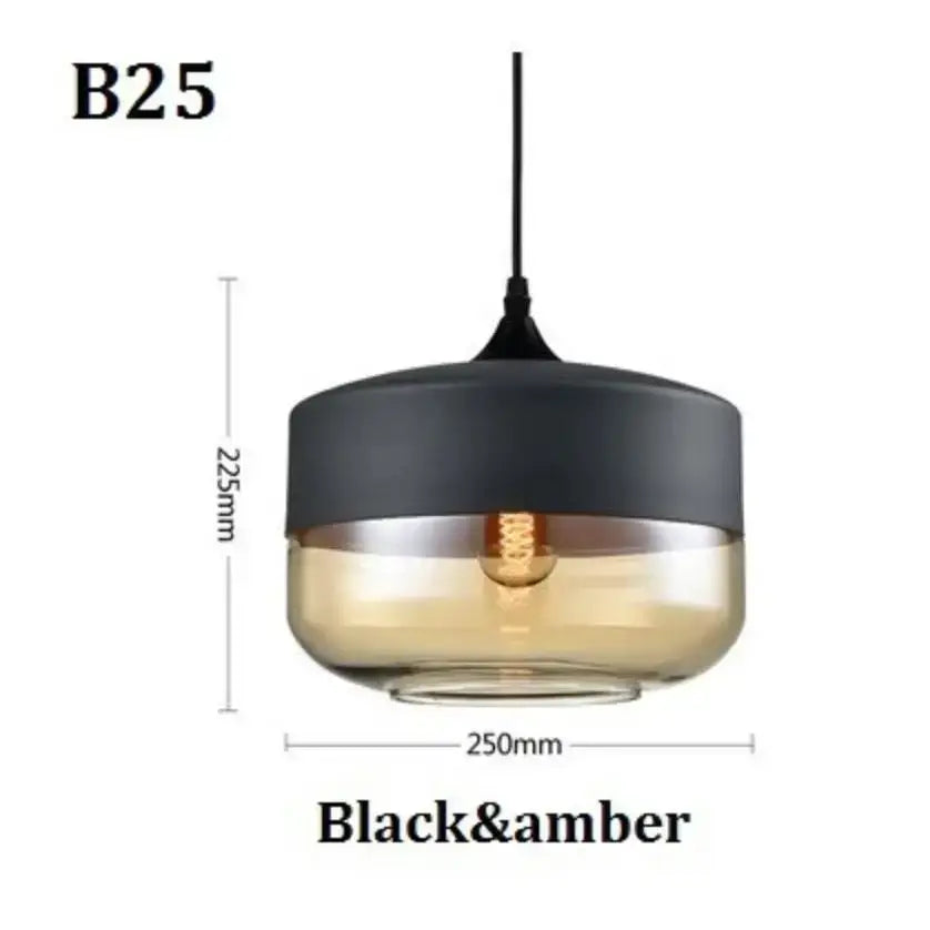 Modern black glass pendant light with matte black top and amber glass lower section for dining room decorbites black glass