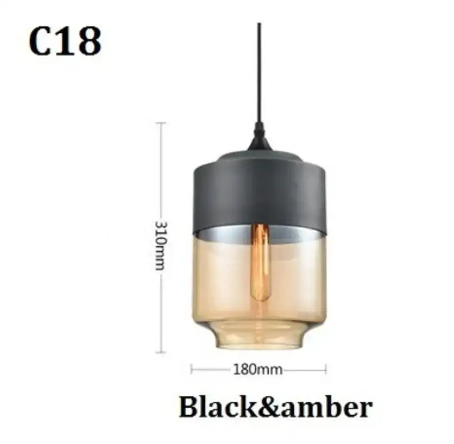 Modern black glass pendant light with matte black cap and amber smoked shades ideal for dining room decorbites