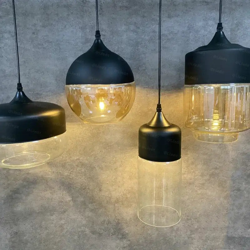 Modern black glass pendant light set with smoked shades for dining room decorbites black glass design