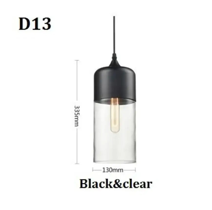 Modern black glass pendant light with clear smoked shades and matte black top cap featuring edison-style bulb decorbites black glass