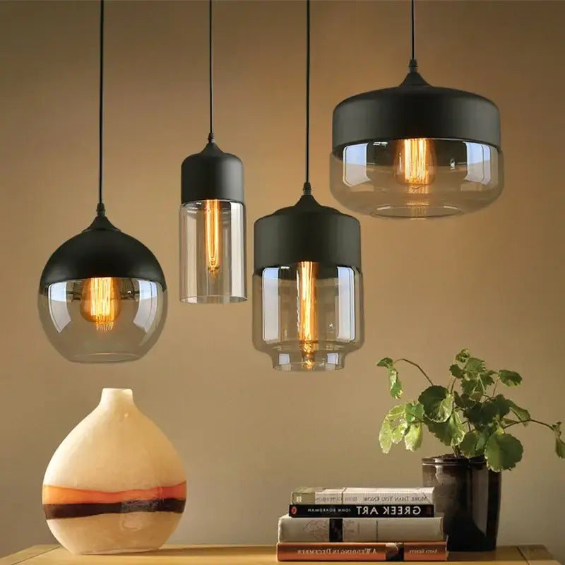 Set of three modern pendant lights with black glass and smoked shades for dining room decorbites black glass style