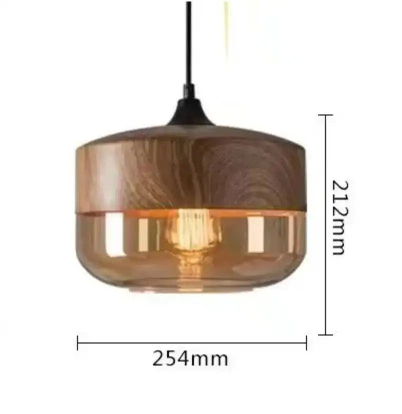 Modern black glass pendant light with warm amber glass shade wooden top and black hanging cord for dining room decorbites black glass