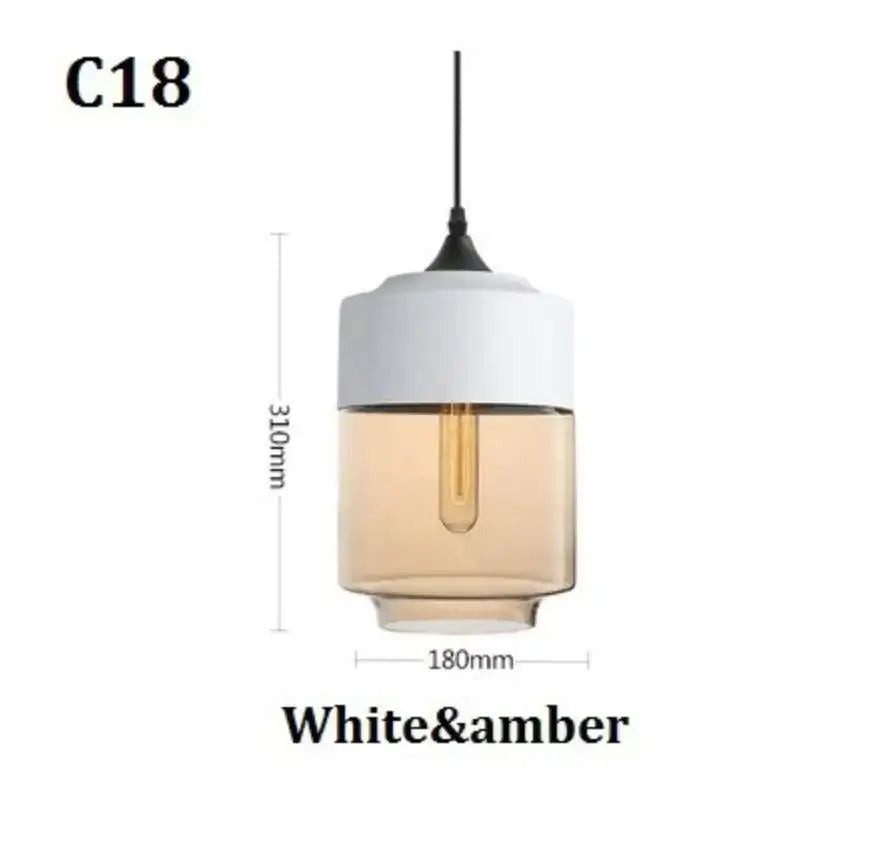 Modern black glass pendant light with white ceramic top amber glass body and exposed filament bulb for dining room decorbites black glass
