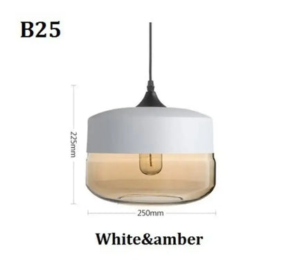 A modern pendant light with a white top and amber amber glass bowl featuring a filament bulb for dining room decorbites black glass