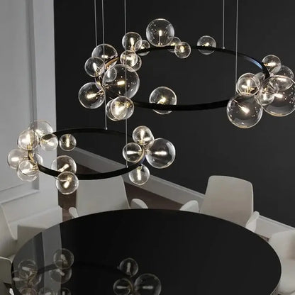 Modern black glass ring pendant light featuring clear glass globe bulbs for elegant dining room decorbites black glass chandelier