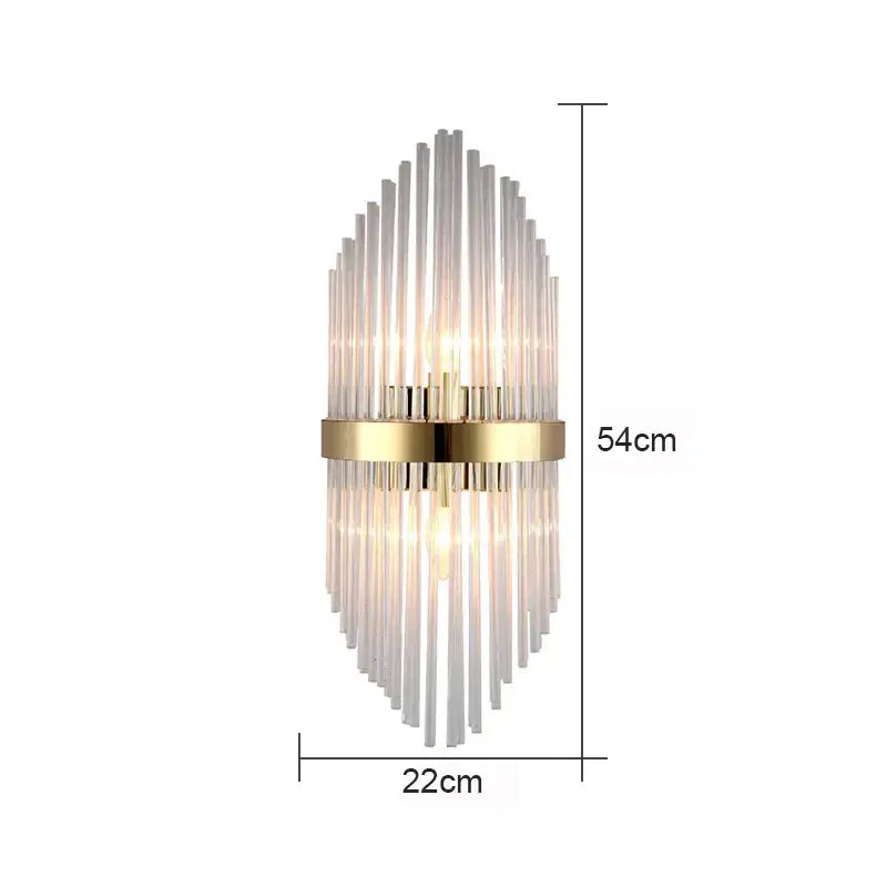 Modern wall lamp with gold-toned metal frame and clear glass rod crystal in an elegant rod crystal wall design for bedroom