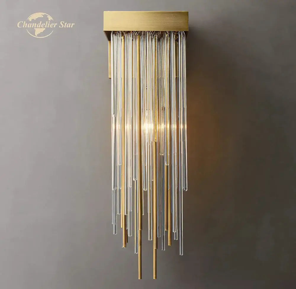 Gold-toned wall lamp with cascading clear glass rod led tubes and brass accents for modern living room decor