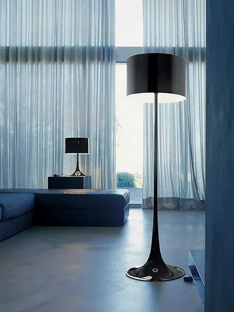 Modern black glossy design mushroom floor lamp with sleek curved stem and flared base for living room decor