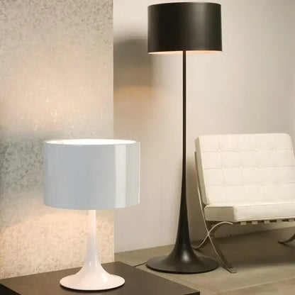 White table lamp with sleek modern design and cylindrical shade complementing decorbites design mushroom floor lamp