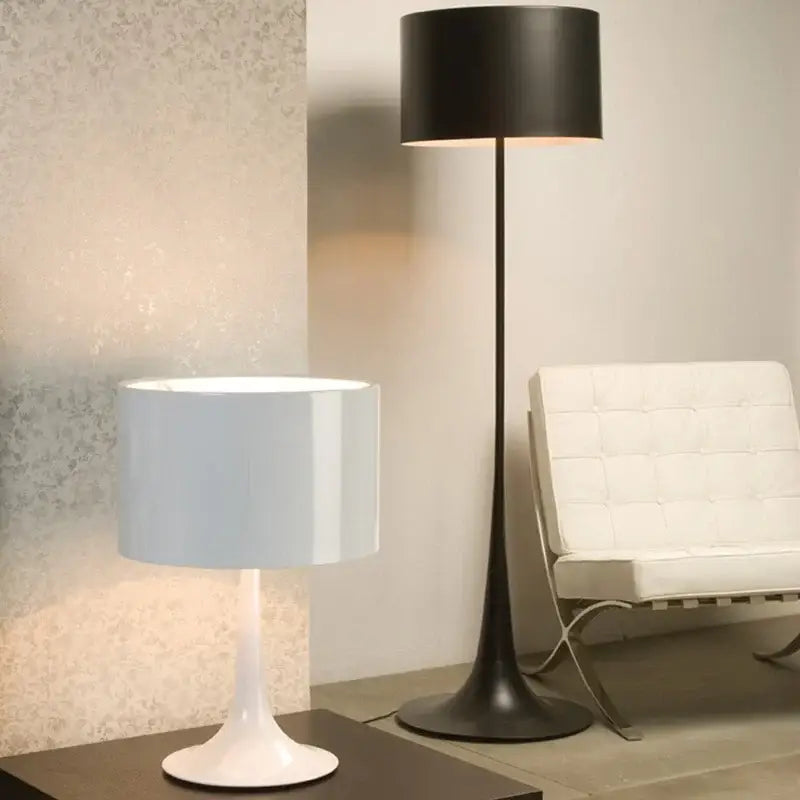 White table lamp with sleek modern design and cylindrical shade complementing decorbites design mushroom floor lamp