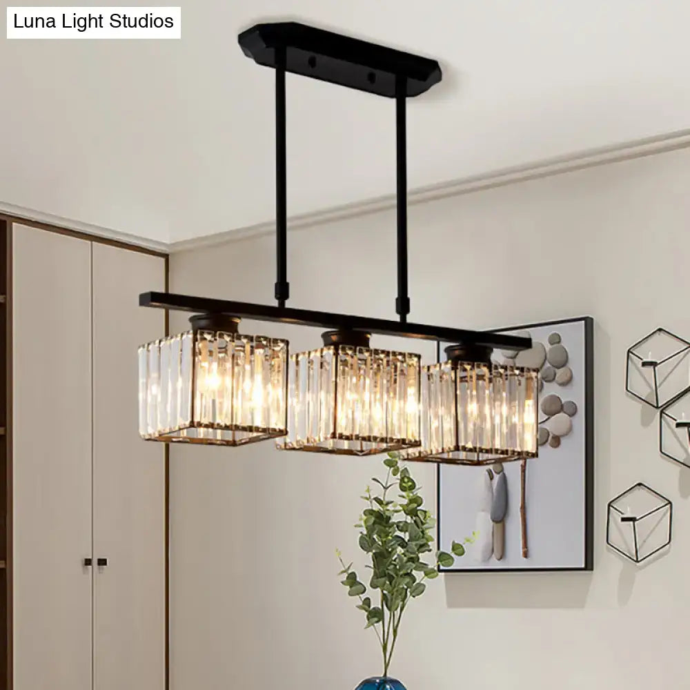 Black metal chandelier with three rectangular glass candle holders featuring e26 bulb base for 110v-120v or 220v-240v use