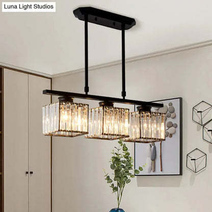 Black metal chandelier with three rectangular glass candle holders featuring e26 bulb base for 110v-120v or 220v-240v use