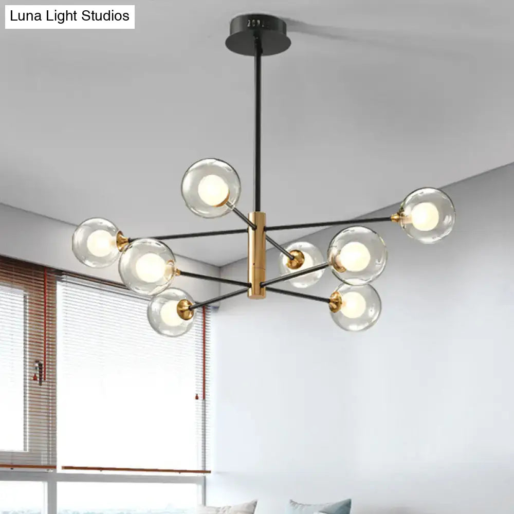 DecorBites modern black and gold chandelier with clear glass globe bulbs and brass rod offers 8-light fixture width