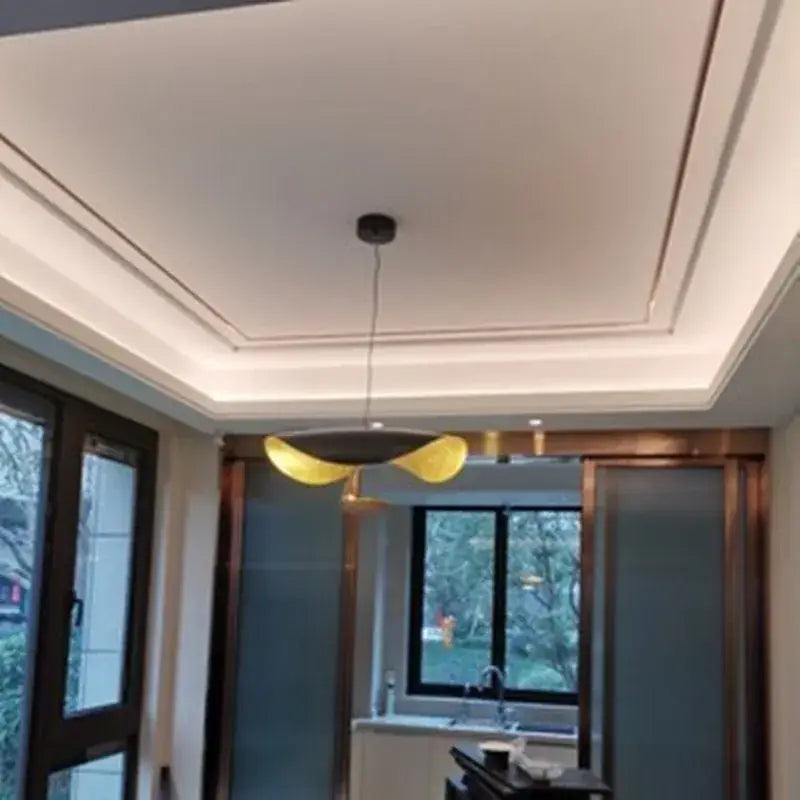 Modern black and gold lederam manta pendant lamp with two golden-yellow shades for dining room decorbites style decor