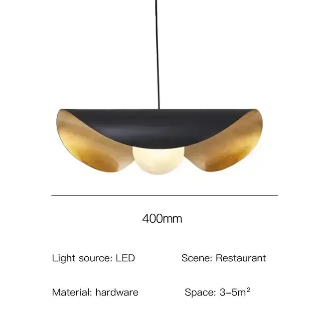 Modern black and gold abstract pendant light with a sleek curved design by decorbites lederam manta pendant for dining room decor