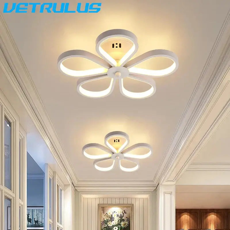 White led ceiling lamp with modern black and gold acrylic flower twisted design featuring five curved petal-shaped arms