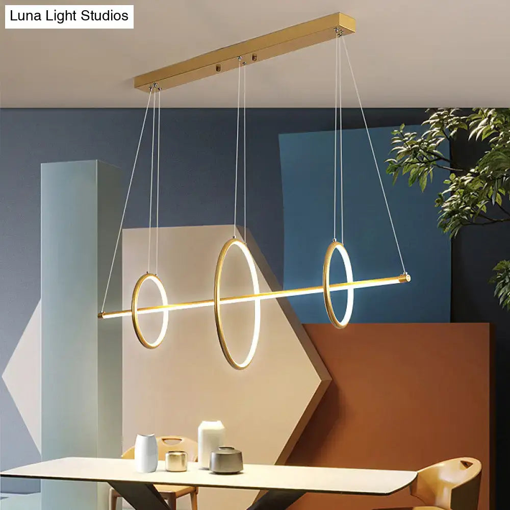DecorBites modern black and gold acrylic linear suspension light with three-ring design for island pendant lighting