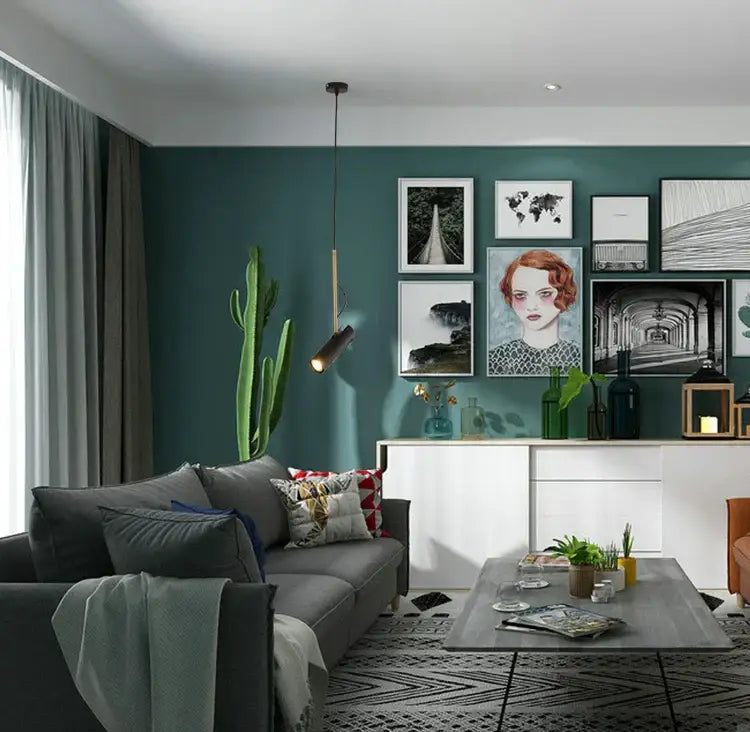 Modern black and gold decorbites adjustable led track light illuminating dark teal wall with framed artwork decorbites adjustable led track